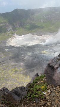 High angle panoramic view of a massive active volcanic crater