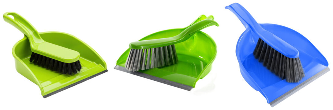 Three colorful dustpans and brushes, isolated on a white background