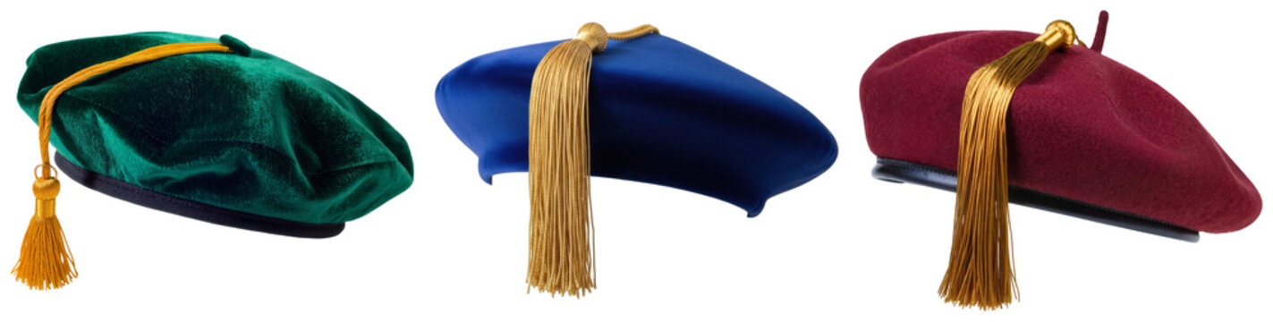 Three academic graduation caps with tassels in green, blue, and burgundy, isolated on a white background.