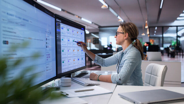 Young Woman Uses Smart Software To Organize Office Files