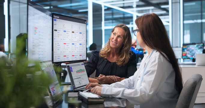 Finance Manager Analyzes Expense Reports On Laptop