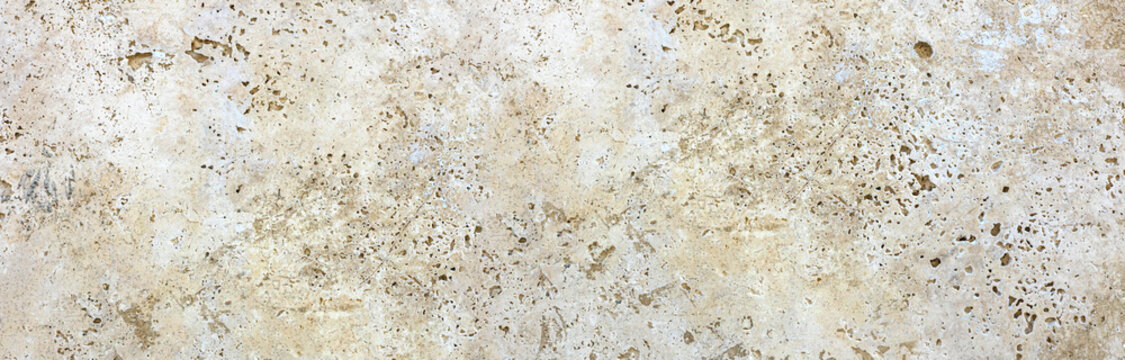 Travertine stone texture showing natural porous surface