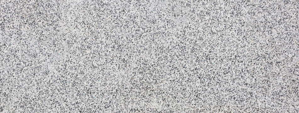 Granite stone surface texture showing speckled pattern