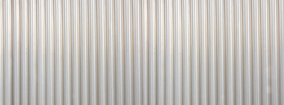 Corrugated metal wall creating a light textured background