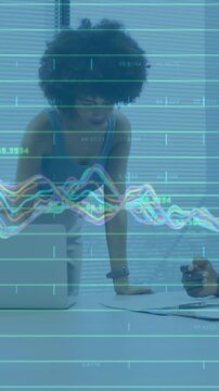 Animation of financial data processing over diverse business people working at office