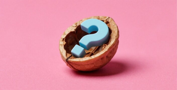 Cracked nutshell holds blue question mark. Symbol of mystery and doubt on pink background. Concept for confusion, problem solving, or unknown ideas.
