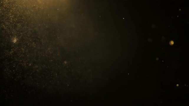 Close-up of dust particles floating in the air against a dark background