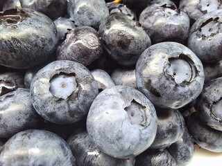 Extreme Macro Shot of Fresh Ripe Blueberries © StasiaVisualStock