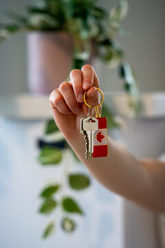 Close-Up of New Home Keys With Canadian Flag Keychain Vertical