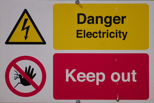 sign, danger electricity, keep out, bright colours yellow, red, white, black