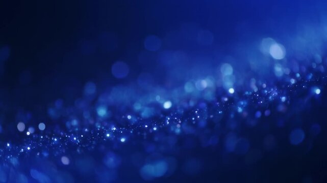 Abstract Blue Bokeh Light Background with Glowing Particles