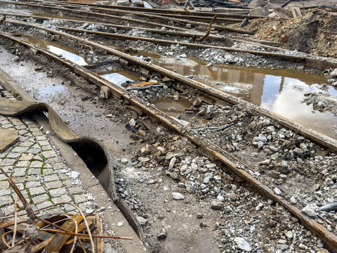 railroad tracks is being renovated in the city for a tram