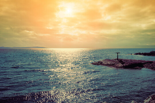 Rocky sea shore. Beautiful nature of Norway. Open sea in the evening. Barents sea. Scandinavian nature landscape