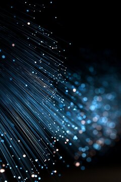Abstract fiber optic cable background with glowing blue digital light lines