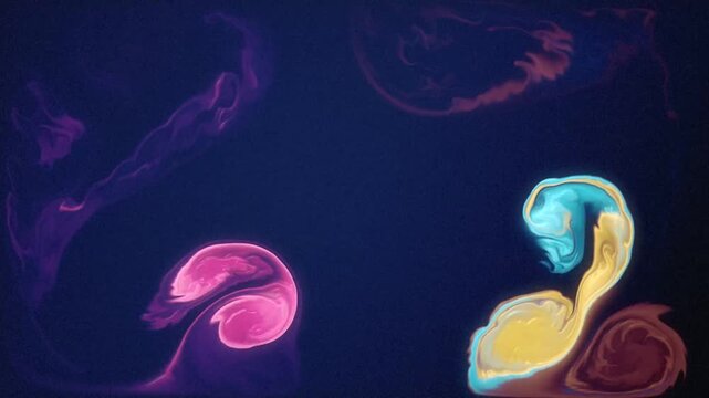Pink cyan and yellow ink blooms swirling through dark blue water as abstract background