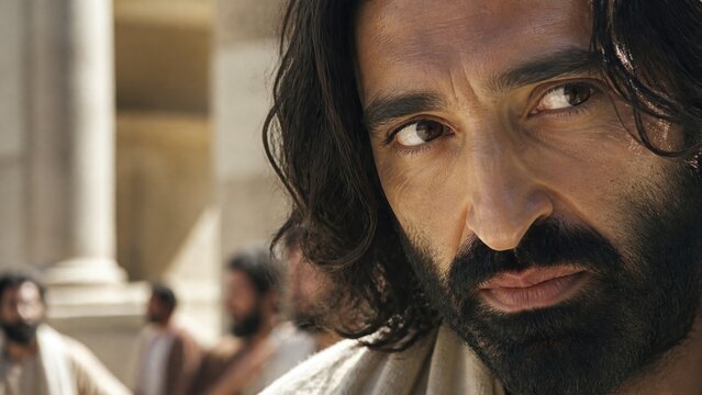 Close-up portrait of bearded man with intense gaze discerning deception in temple court. Biblical wisdom and spiritual insight concept for religious teaching and faith illustration