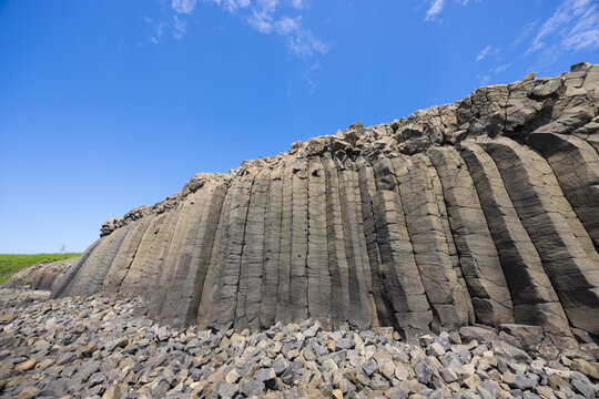 Basalt column rock formation against blue sky in Penghu