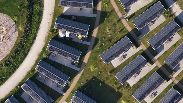 Aerial view of modern modular houses with solar panels