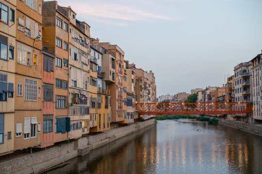 View of the Eiffel Bridge of Girona City in the Colorful Houses of the Onyar River