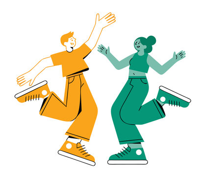 Young couple enjoying freedom dancing celebrating joy