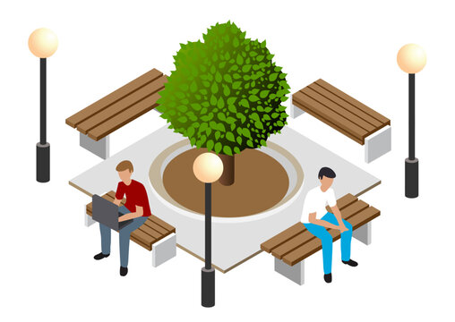 People relaxing and working in an urban park