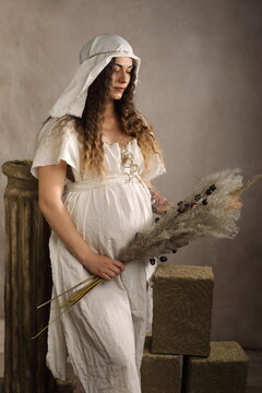 Artistic Full Body Maternity Portrait in Medieval Dress with Unretouched Skin
