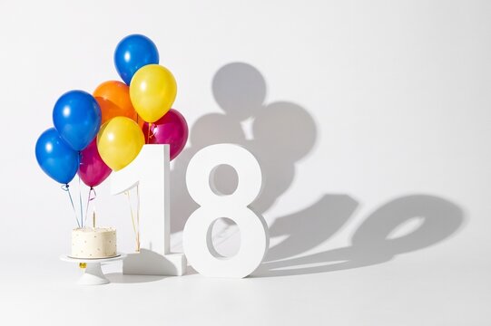 18th birthday celebration with colorful balloons and number
