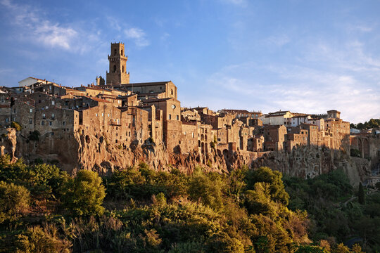 Pitigliano, Grosseto, Tuscany, Italy. Dawn view of the picturesque medieval hill town and historic center, founded by the Etruscans and built on a tuff cliff.