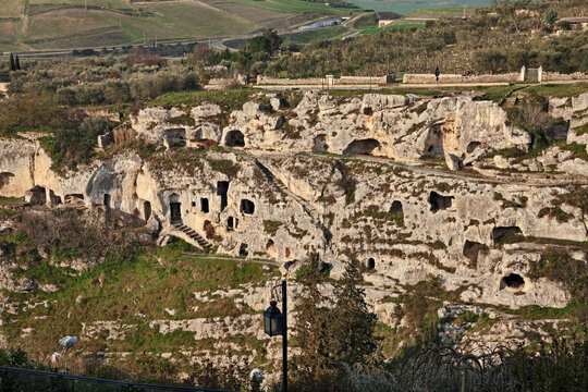 Gravina in Puglia, Bari, Italy. View of the Seven Chambers, a cave settlement dug in the early Middle Ages into the wall of the canyon.
