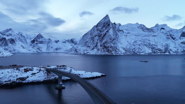Aerial view of bridge and snow covered mountains in lofoten, Norway