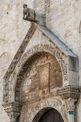 Fototapeta premium Carved Stone Arch Detail on Basilica San Nicola in Bari, Italy