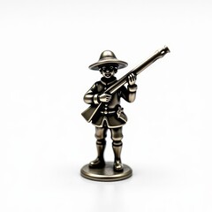 Fototapeta premium Dutch 17thcentury musketeer pewter toy soldier with broadbrimmed hat and musket on white background