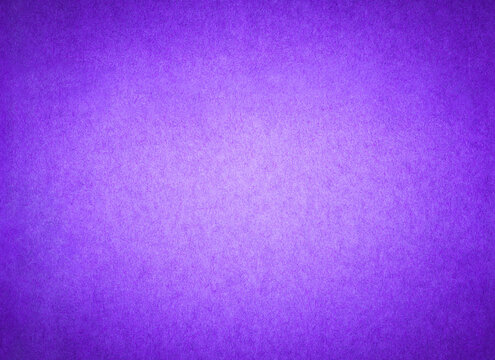 Pink color paper background texture. Sheet of bright fuschia stained arts and crafts cardboard with rough discoloured textured grain surface.