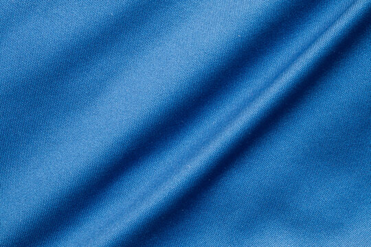 Blue sports clothing fabric football shirt jersey texture close up