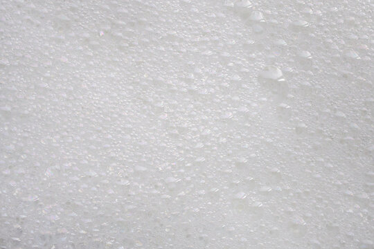 Closeup abstract white soap foam bubbles texture background