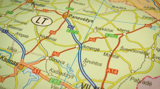 Flyover motion across map showing main highway route connecting Panevezys to Vilnius,Lithuania