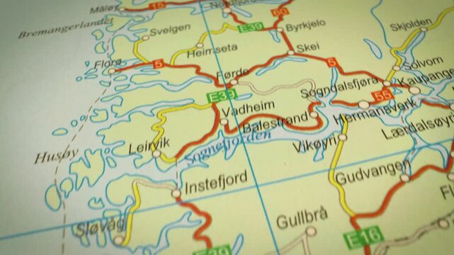 Gliding  view over  atlas map panning to Bergen, Norway