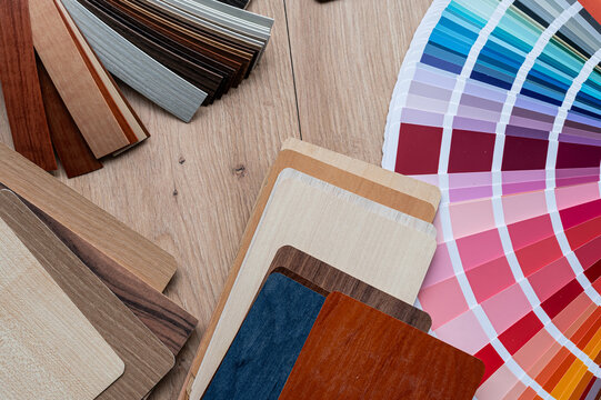 Close up of Bright Color Fan Chart Spread with Diverse Wood Texture Samples for Home Decor Match