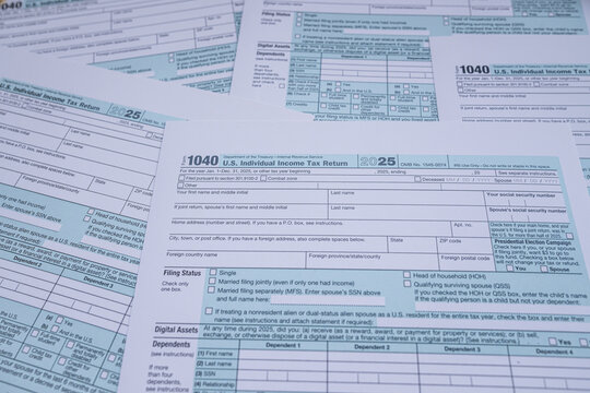 US Individual Income Tax Return Form 1040 Blank Documents for Annual Filing and Accounting Concept