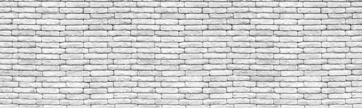 White brick wall texture background repeating pattern