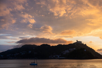 Fototapeta premium Golden Sunset over La Concha Bay and Beach in San Sebastian, Basque Country, Spain