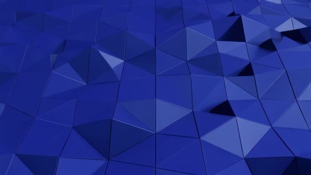 Abstract blue geometric shapes with dynamic light shifts during a slow camera zoom for technology concepts