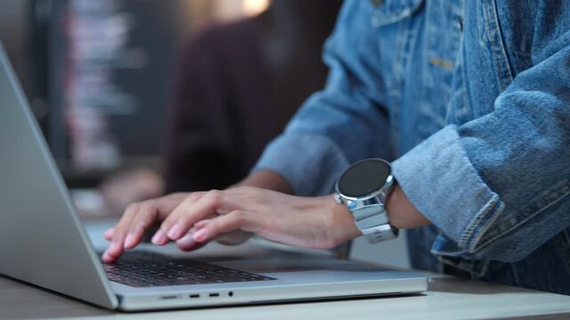 Software Developer Typing on Laptop While Working on Programming Project