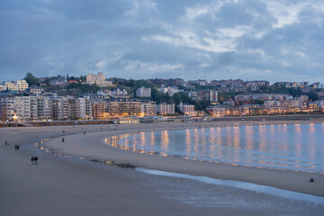 Fototapeta premium Golden Sunset over La Concha Bay and Beach in San Sebastian, Basque Country, Spain