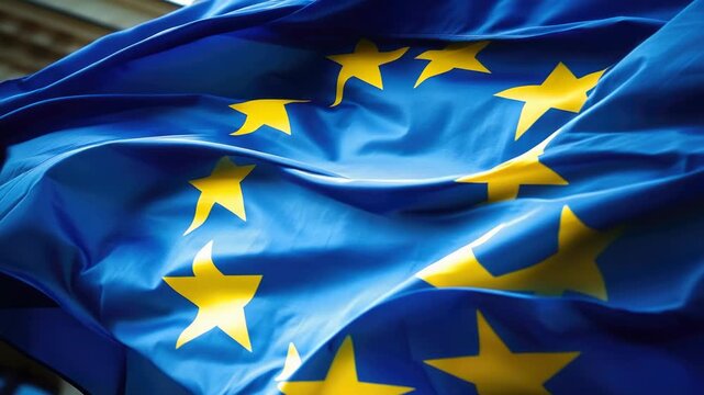 Close-up of the waving European Union flag with yellow stars