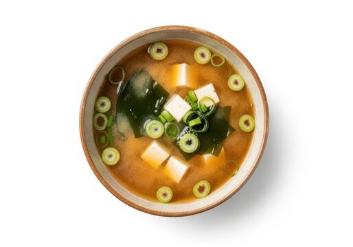 Traditional Japanese miso soup in a bowl top view isolated