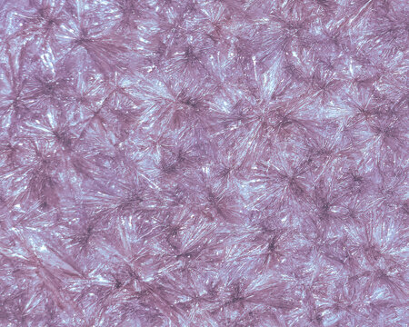 Horizontal abstract pink and purple crystal mineral texture background