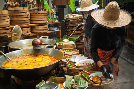 The famous Khao Soi Yukkamai restaurant at Baan Kang Wat,Chiang Mai, Thailand  An open air Northern Thai restaurant at Baan Kang Wat, featuring bamboo d&eacute;cor, perfect for lunch in Chiang Mai Thailand.