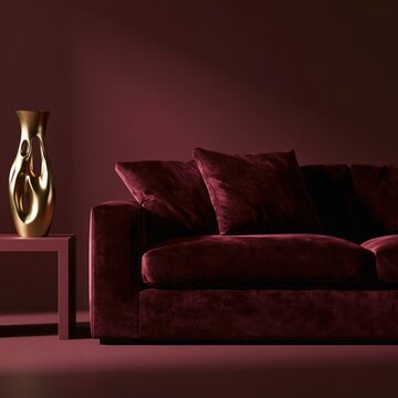 Moody Burgundy Lounge with Sculptural Golden Vase and Velvet Seating in Dramatic Contemporary Setting