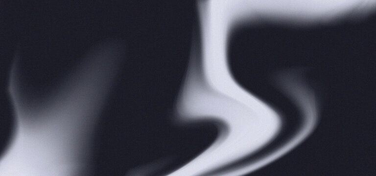 Abstract black and white smoke swirls with soft gradient transitions